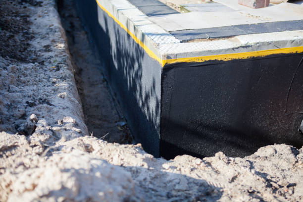 Professional Waterproofing technician working in Bowling Green, OH